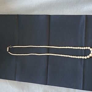 18 inch graduated faux pearl necklace.